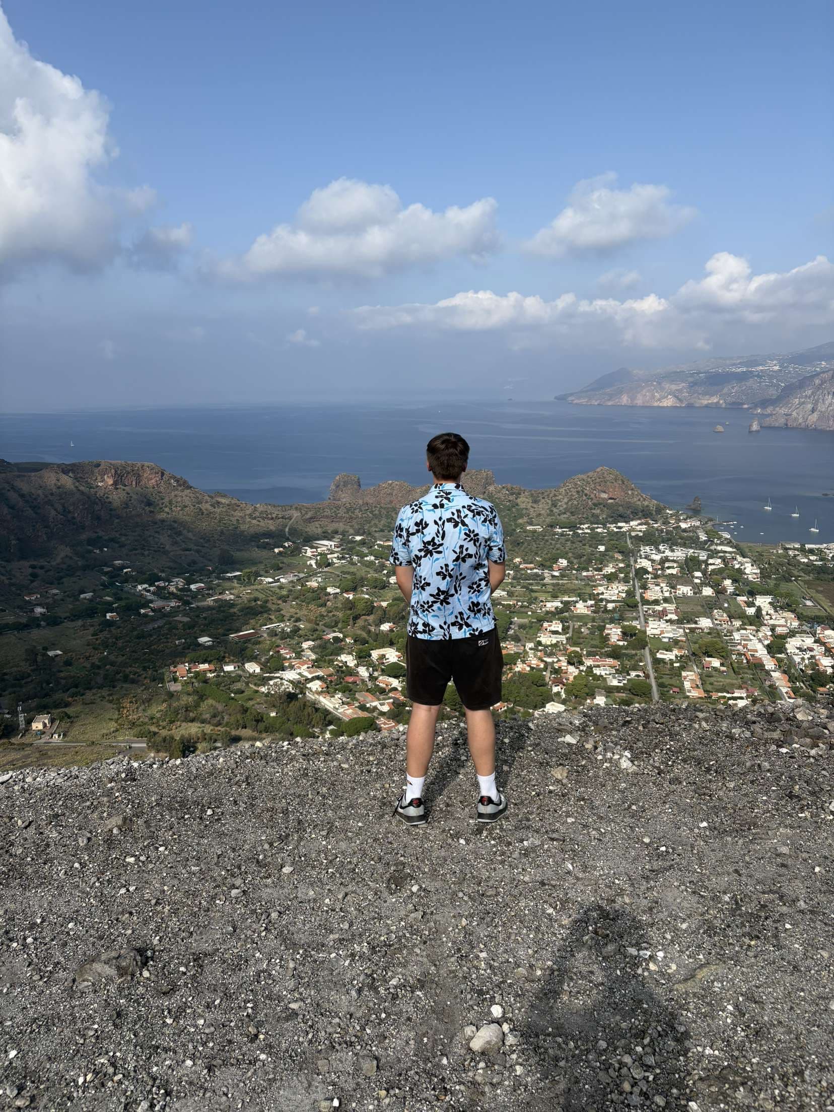 Founder of Kepler Revise standing above a coastal landscape